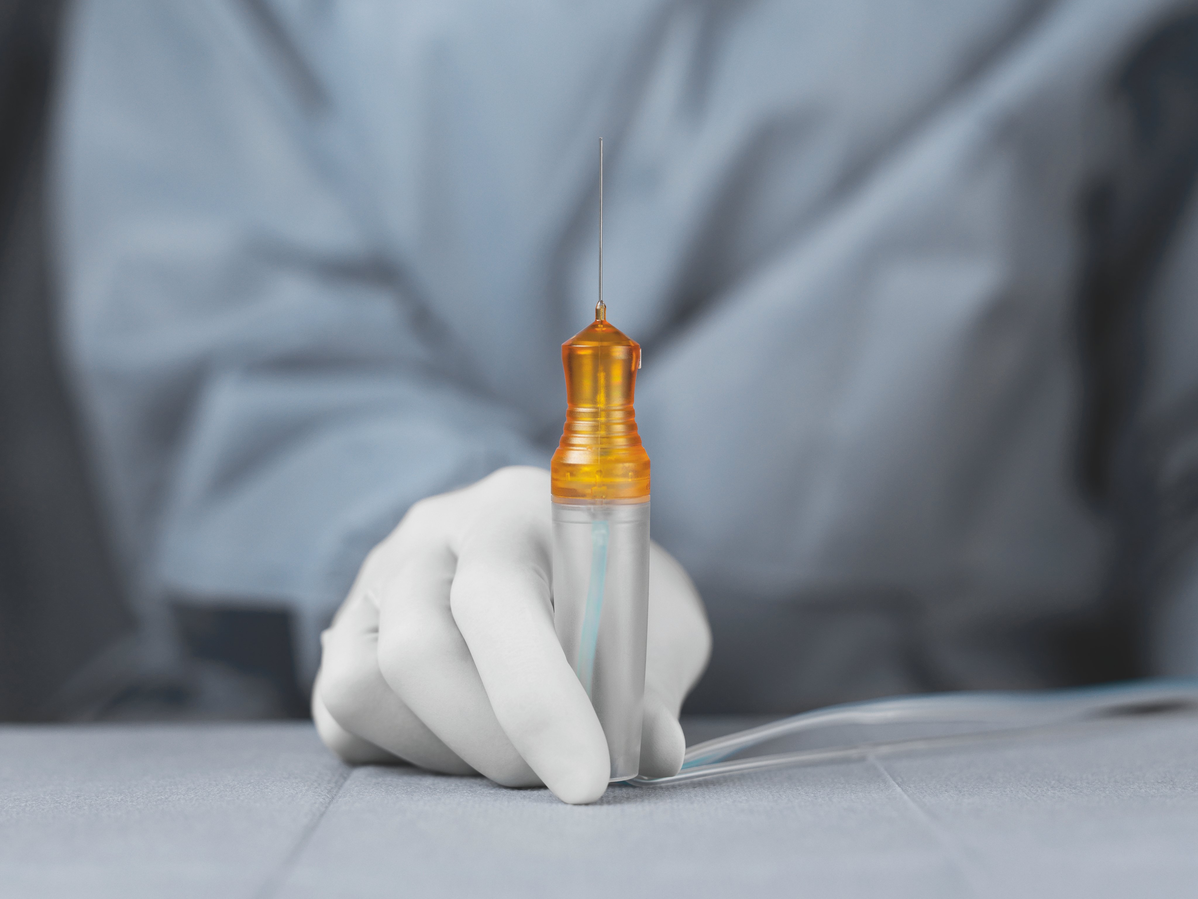  A surgeon holding a cutter instrument 