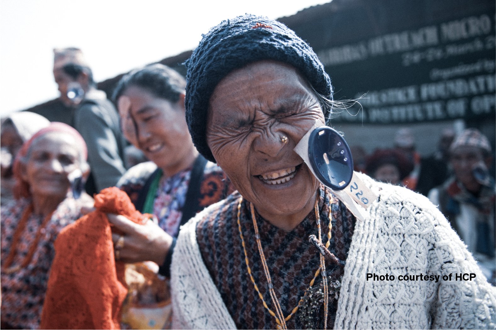 Smiling patient wearing eye protection during the Cure Blindness Himalayan cataract outreach project