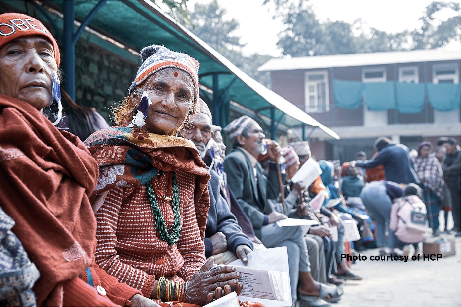 Patients waiting outdoors during a cataract outreach programme organised by the Himalayan Cataract Project