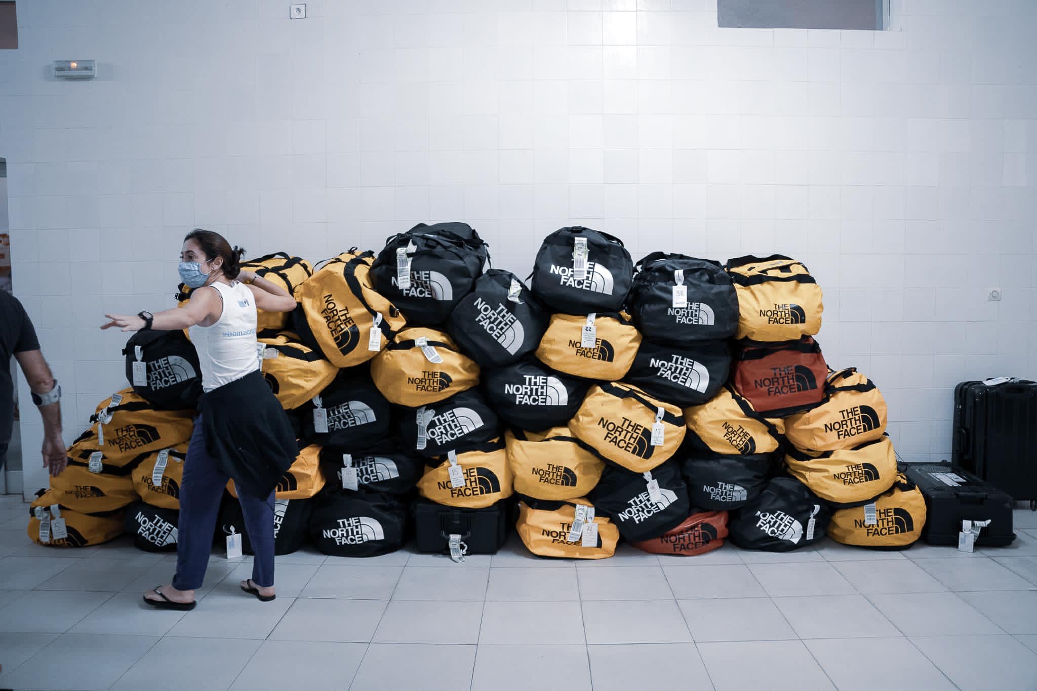 Large stack of travel bags and equipment prepared for a Fundación Elena Barraquer ophthalmic outreach programme