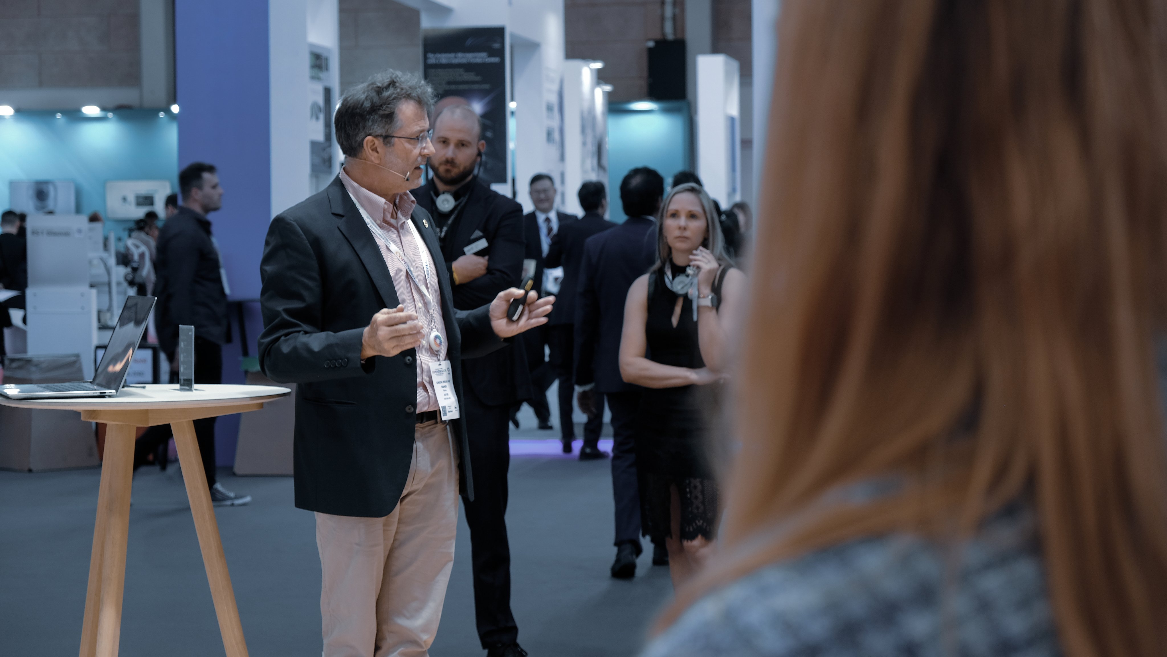 Oertli booth talk at ESCRS 2025 with a speaker presenting to attendees in the exhibition hall
