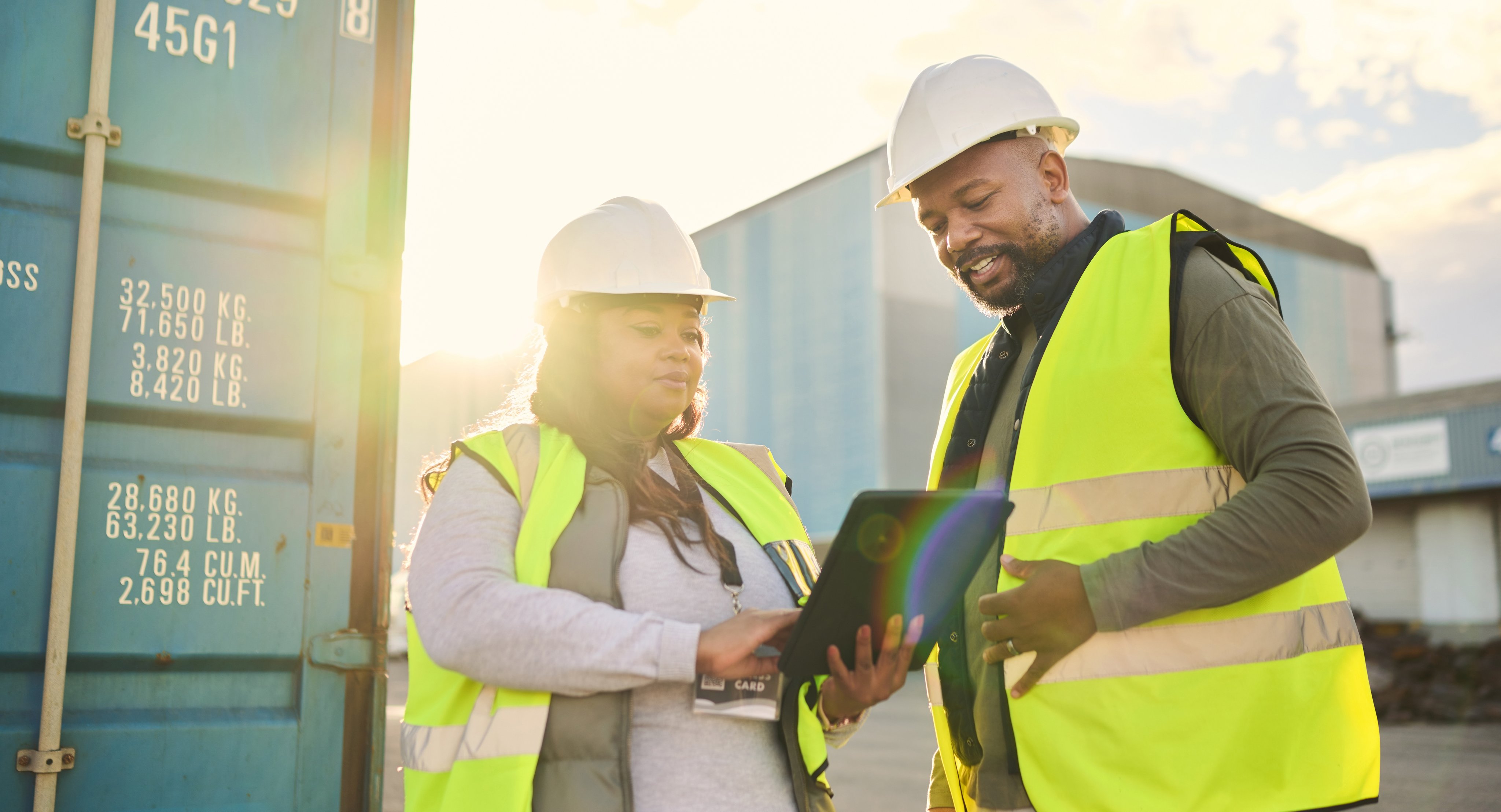 Ecommerce, supply chain and tablet with a man and woman working as a team in logistics, shipping and delivery. Teamwork, freight and cargo with a male and female at work in the export industry.