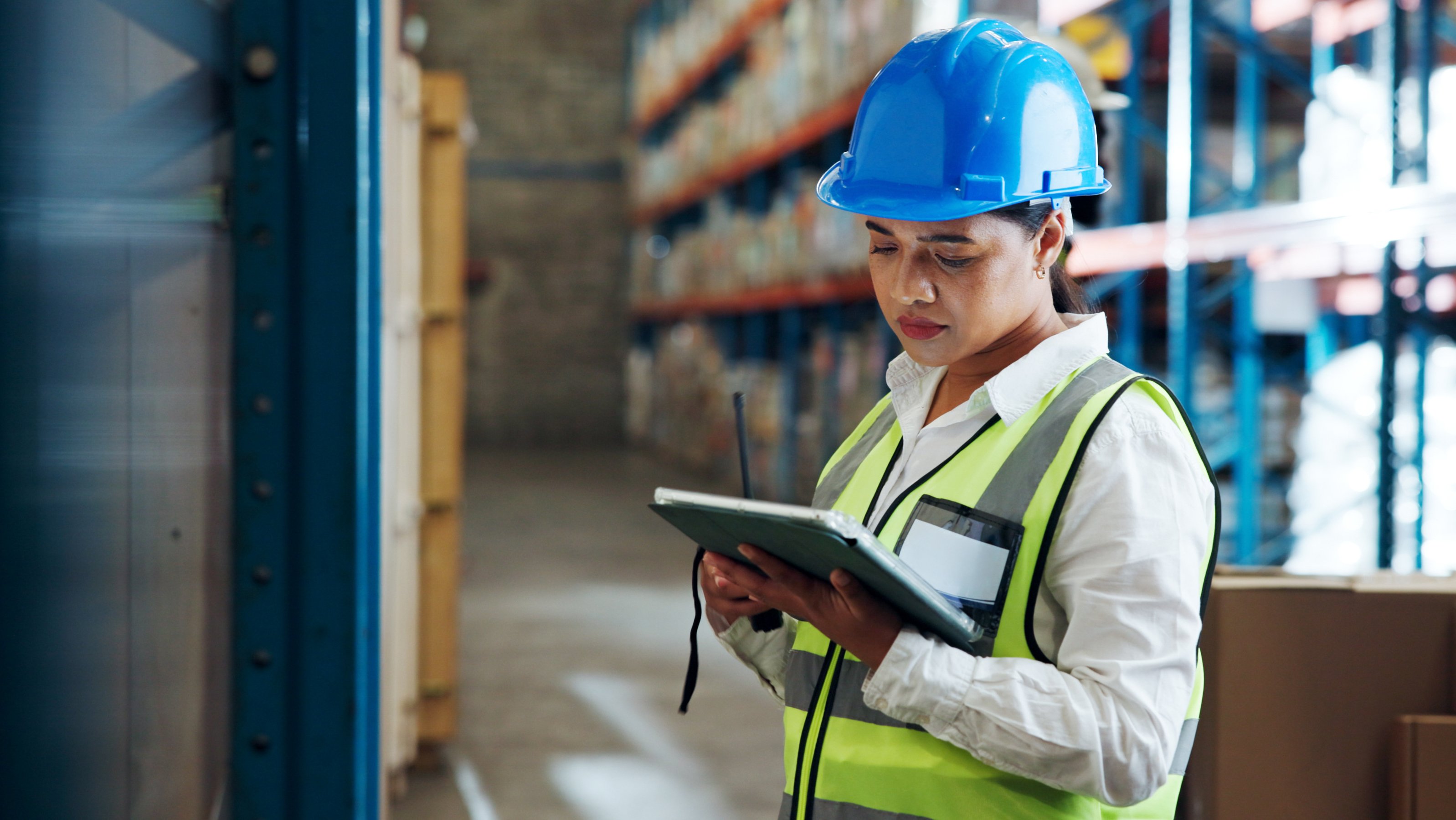 Tablet, logistics worker and woman in warehouse for distribution, supply chain or check stock. Digital technology, shipping and person with inventory management for cargo, storage or quality control.