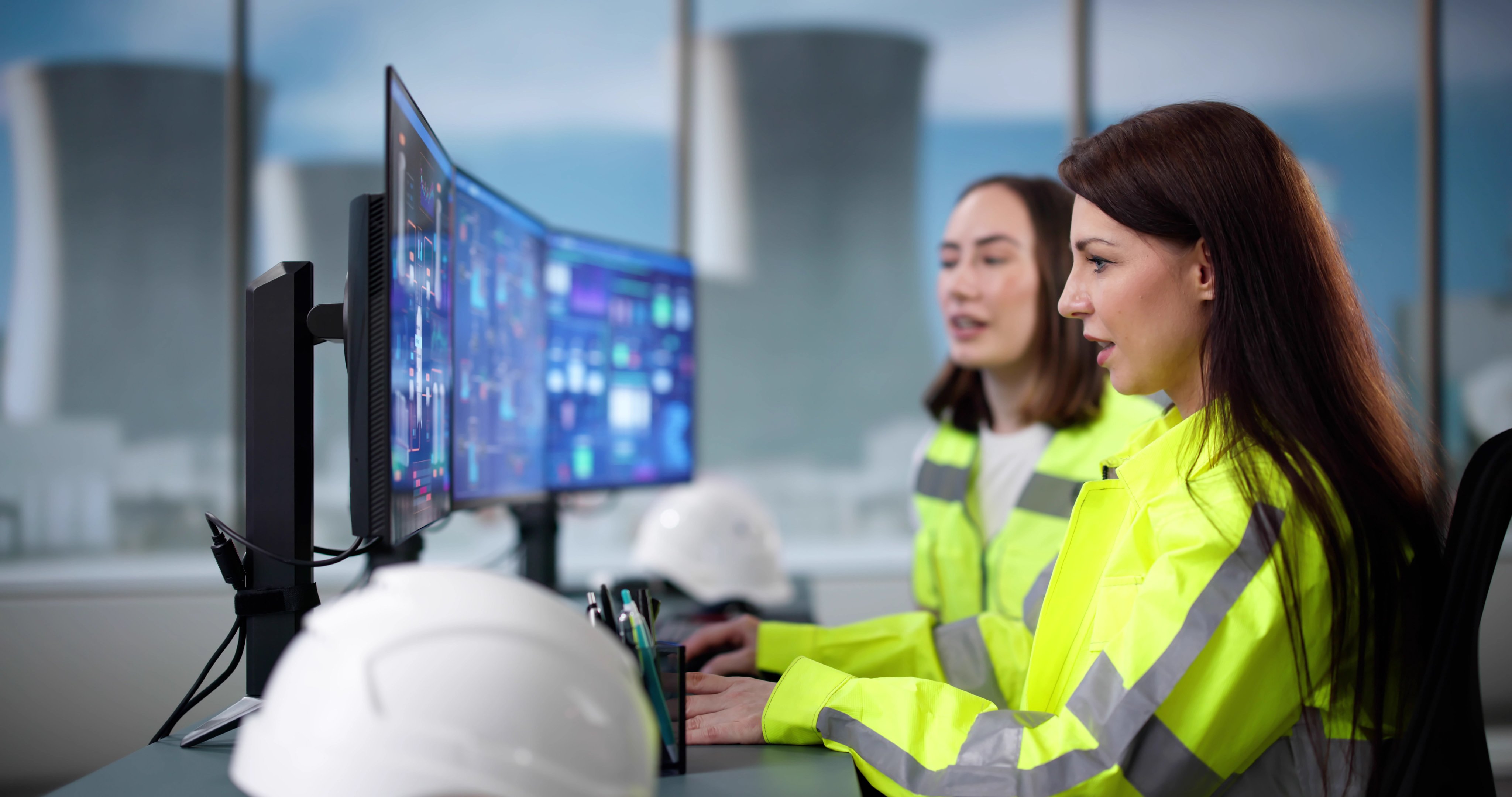 Worker Supervises Nuclear Power Plant Operations With SCADA System Monitoring.