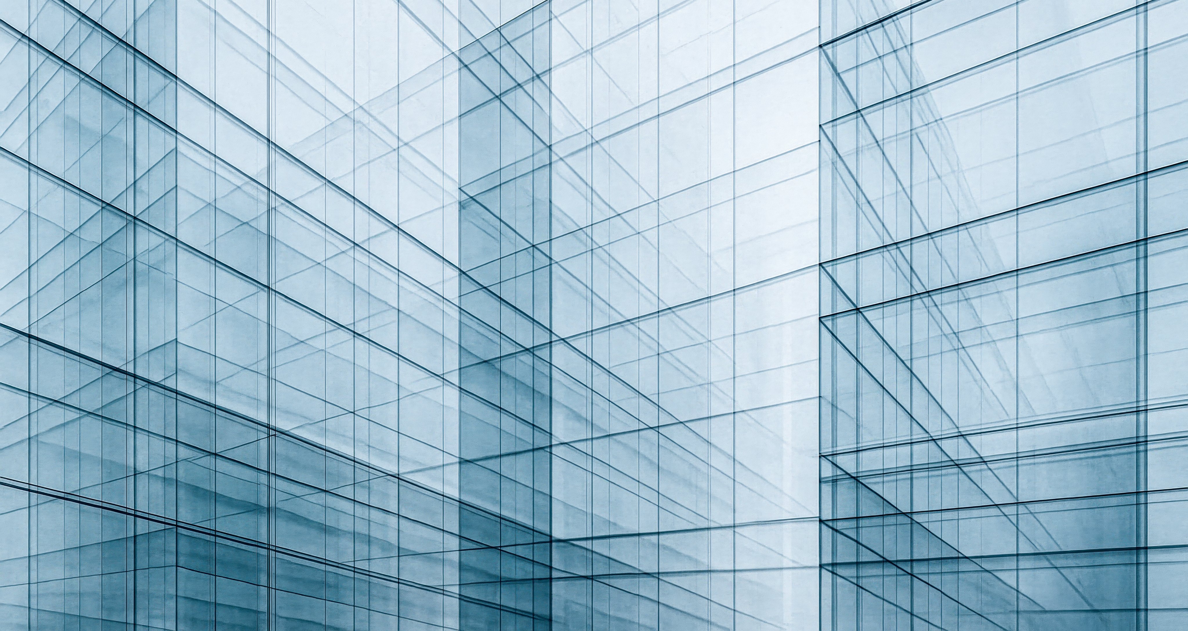 Minimal urban architecture composition shows reflective skyscraper walls intersecting at sharp angles producing futuristic illusion depth symmetry clarity technology finance innovation style