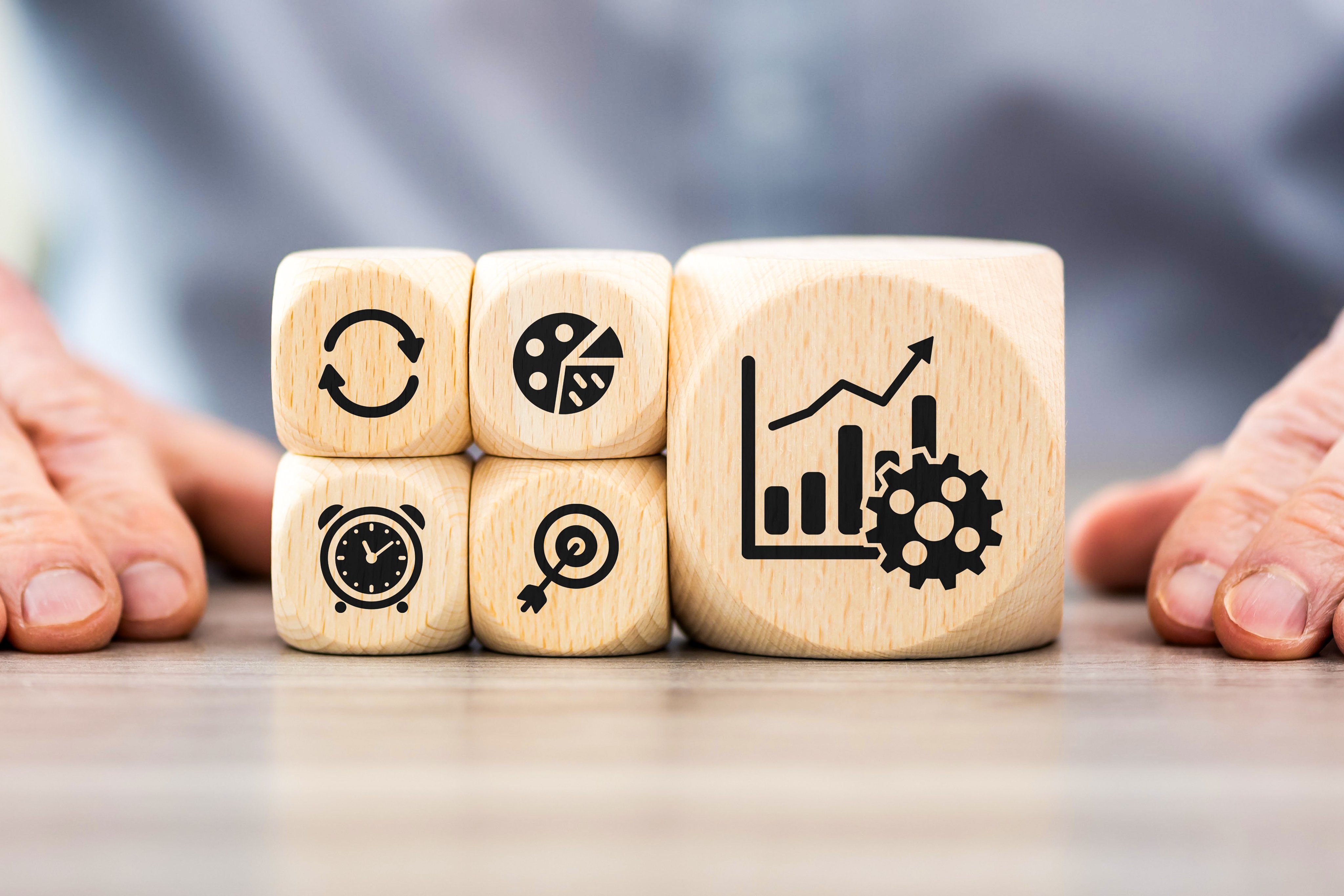 Wooden blocks with symbol of productivity concept