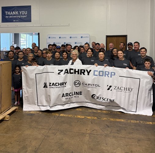 Zachry team members gathered at a community volunteer event