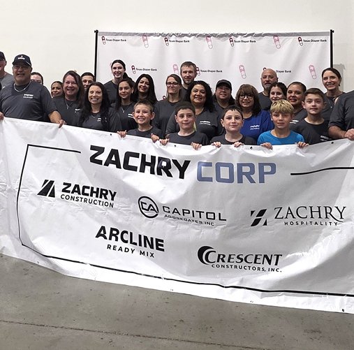 Zachry team members and their families gathered at a community volunteer event