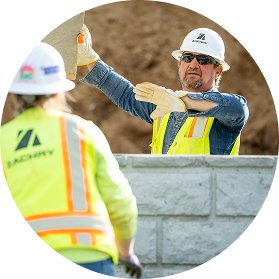 Zachry construction workers discussing work on a jobsite