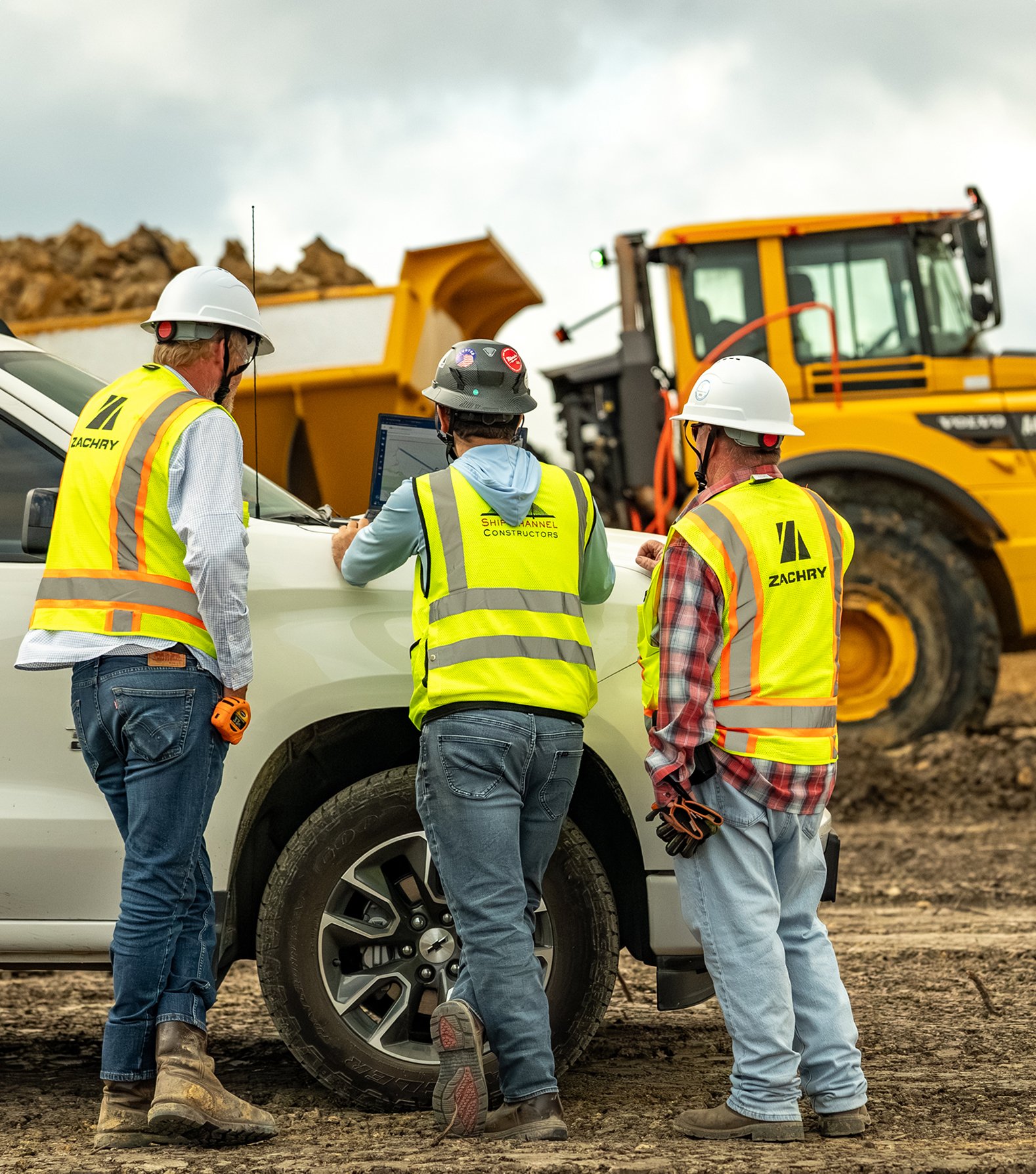 Zachry team members review plans at a civil sitework project