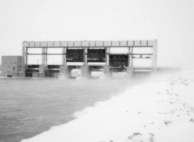 Missi Falls hydroelectric control structure under construction in snowy Manitoba, Canada